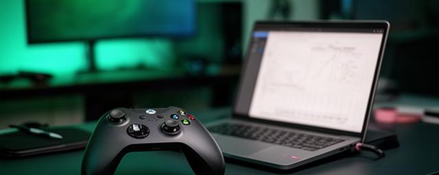 Xbox Series controller and performance test notebook on a home gaming setup
